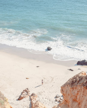 Cliffside Beach Woman