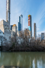 New York City, NY, USA - 25th, December, 2018 - Beautiful cold sunny day in Central Park lake with ducks near Gapstow Bridge.