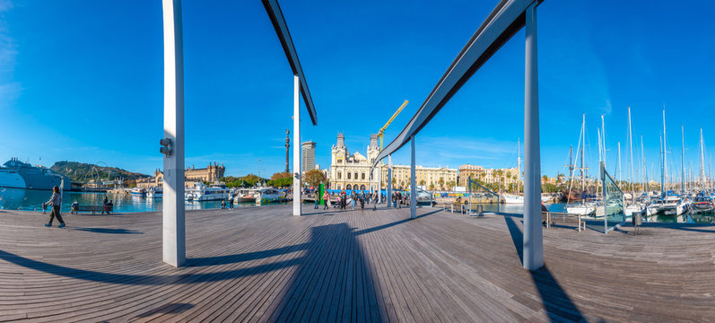 Barcelona, Spain, Dic 02,2018: People walking over Rambla de Mar promenade in Barcelona, Catalunya, Spain.