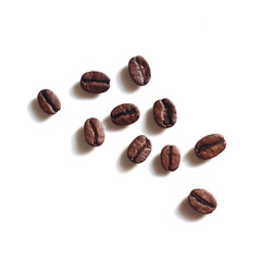 Coffee beans isolated on white background close up