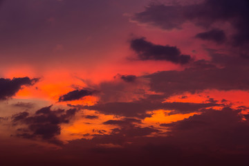 Evening sky with sunset light and colorful clouds as a background