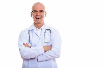 Young happy bald man doctor smiling while wearing eyeglasses wit