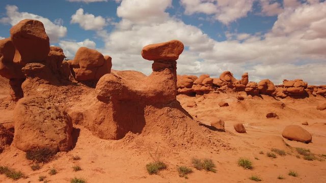 View of Hoodoos seen in Goblin Valley Utah. The camera does a close up shot of one of the Hoodoos.