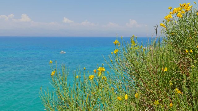 The view from the mountains to the turquoise waters of the ionic sea. Coast of Corfu island, Greece.