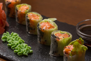 Rice Paper Sashimi Roll served on black stone