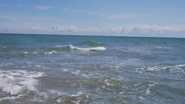 Handheld Wide Shot of The Two Oceans That Meet Outside Skagen at Grenen Beach in Denmark With Waves Crashing Into Eachother from The North Sea and The Baltic Sea