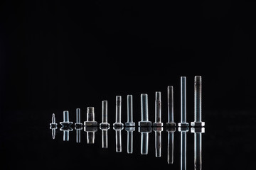 new shiny metallic bolts isolated on black