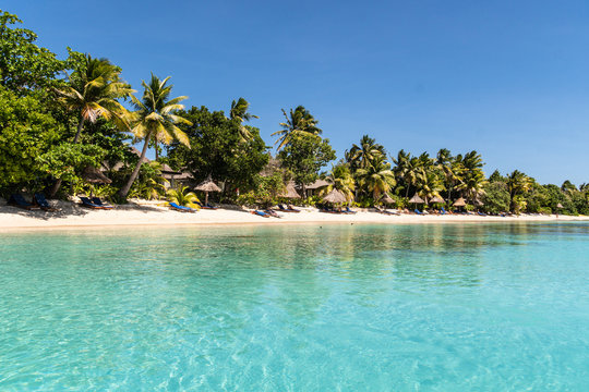 Idyllic turquoise water by an exotic beach in the Yasawa island in Fiji in the south Pacific ocean