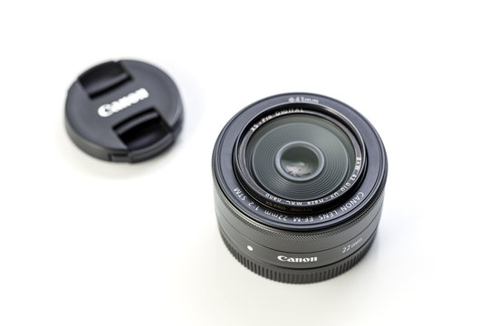 BANGKOK, THAILAND - FEBRUARY 5, 2017_CANON LENS EF-M 22mm f/2 STM, announced by Canon in 2012. It is a lightweight pancake lens with compactness for EOS M, sliding effortlessly into most pockets.