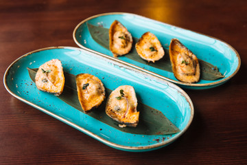 Mussel with cheese.