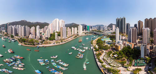 Aerial panorama of the crowded Aberdeen and Ap Leu Chau island in Hong Kong and the sampan...