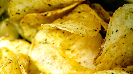 close up Crispy potato chips fat food or junk food. macro photography