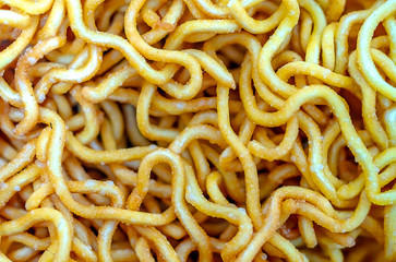 close up asian dry fried raw egg noodles