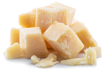 Parmesan cheese cubes isolated on white background.