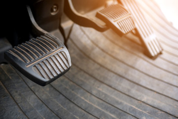 Foot pedals are levers of forklift car that are activated by the driver's feet to control certain aspects of the vehicle's operation brake pedal Car accelerator  controls. - obrazy, fototapety, plakaty