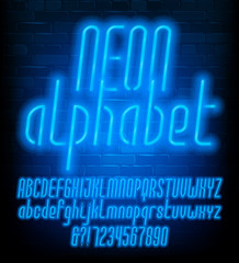 Neon alphabet font. Uppercase and lowercase narrow letters. Blue neon light letters and numbers. Brick wall background. Stock vector typescript for your typography design.