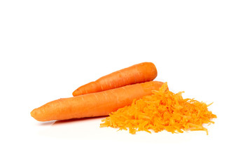Fresh grated carrot isolated on white background.
