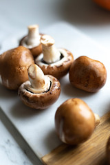 Fresh raw royal champignon on marble board