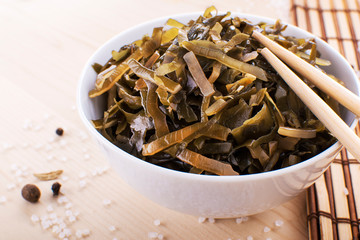 Seaweed. Kelp on the beach. Seaweed and Kelp on the sand on the pacific ocean of Southern California. Seaweed and Kelp can be considered edible and used in many food dishes.