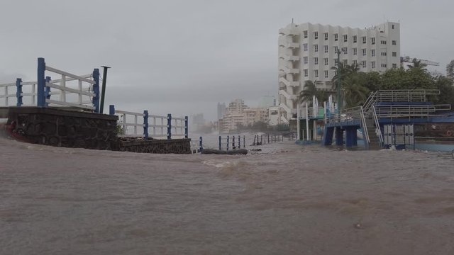 Water running down a slope in a flooded area