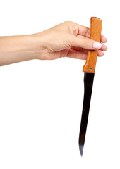 Hand with kitchen knife, home utensil, wooden handle.