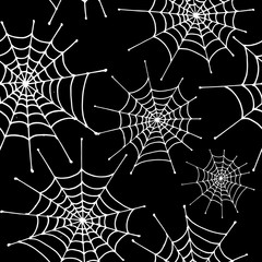 Spiderweb pattern. White hand drawn spiderwebs on black background. Seamless vector backdrop