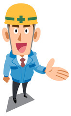 何かを紹介する青い作業着を着た建築現場作業員