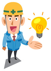 アイデア、解決策を提案する青い作業着を着た建築現場作業員