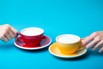 yellow and red cup on a blue background