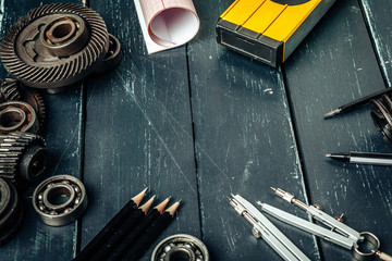 Machine engineer tools set on dark wooden background