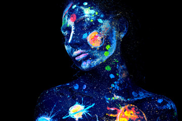 Fototapeta UV painting of a universe on a female Halloween body portrait obraz