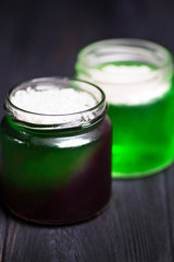 homemade green juice jelly with tarragon and kiwi in a glass jar