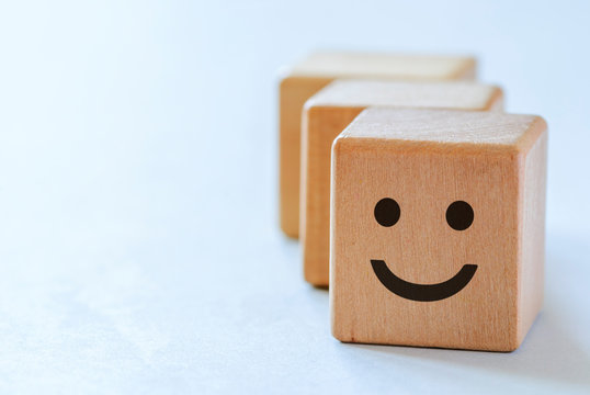 Happy face emotion on dice side