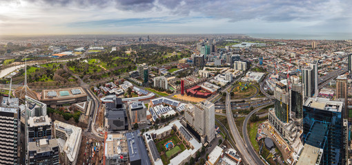 Fototapeta na wymiar Panoramic view of Melbourne from 108 Southbank Boulevard; view encompasses the MCG, AAMI stadium round to Port Phillip Bay