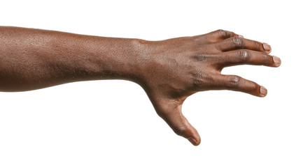 Hand of African-American man holding something on white background