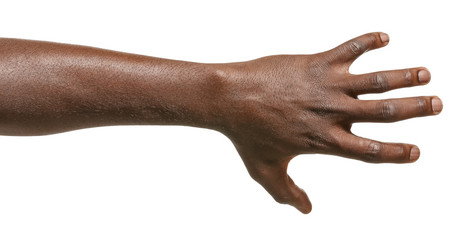 Hand of African-American man holding something on white background