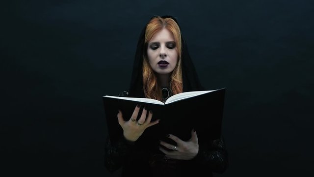 Gothic witch  reading book 