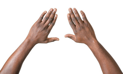 Hands of African-American man on white background