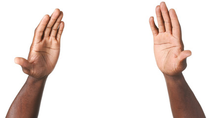 Hands of African-American man on white background