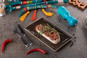 veal bruschetta with wheat sprouts. healthy food beautiful and tasty food on a plate