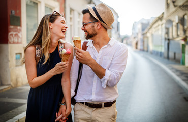 Holidays, vacation, love and friendship concept. Smiling couple having fun