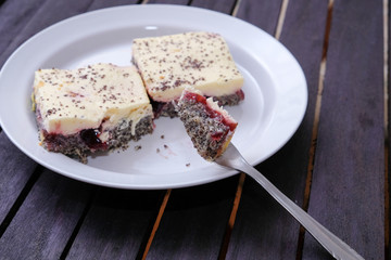 piece of  poppy seed cake on a plate