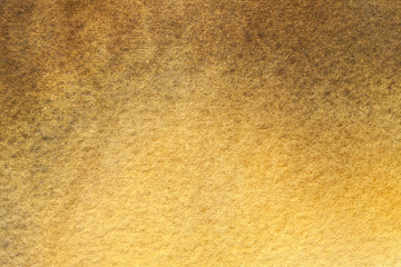 Texture of old light yellow paper closeup. Abstract art background golden color.