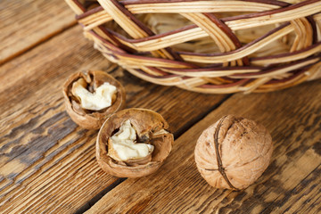Walnuts close-up over the wooden natural background