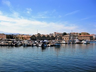 Fototapeta premium The coastal area, old harbour and the characteristic Venetian buildings in Chania town, Crete, Greece.