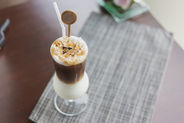 Iced coffee long glass In a coffee shop