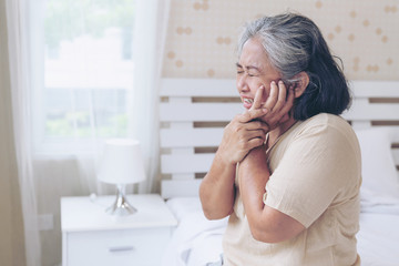 Asian senior woman patients Toothache hurts - Elderly patients medical and healthcare concept