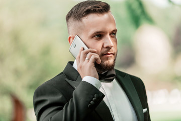 close up. businessman talking on his smartphone