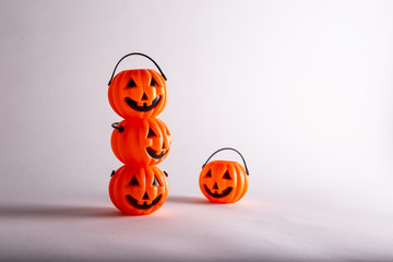 Halloween funny pumpkins pile. white background, Halloween decorations
