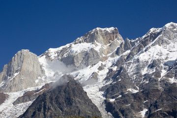 Fototapeta na wymiar Landscape with snow mountains. Travel, alpinism concept. Copy space